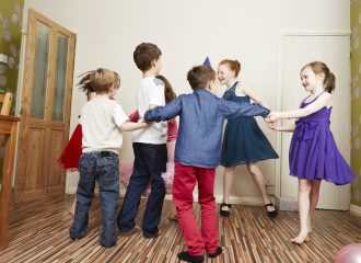 Children dancing at birthday party